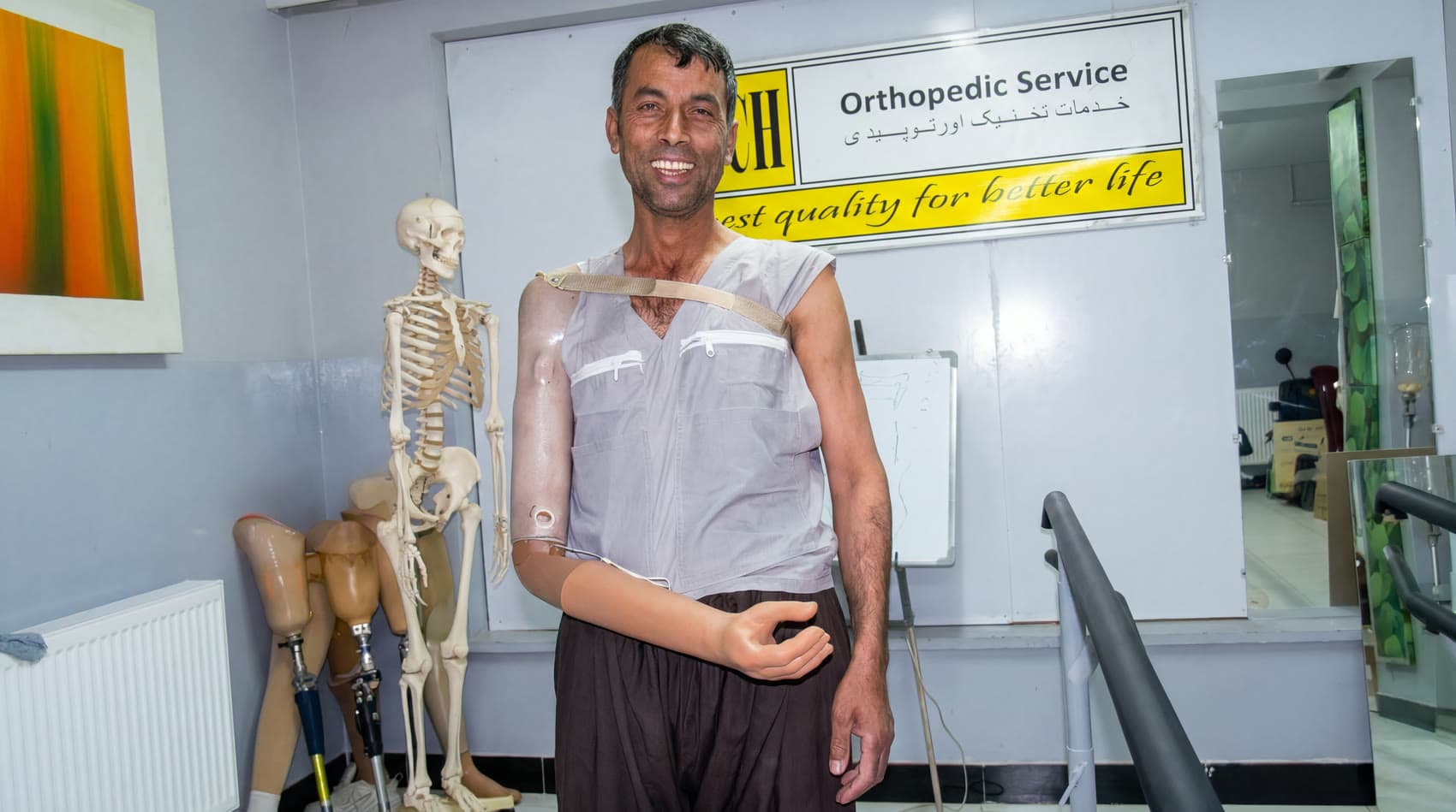A new arm, a wide smile